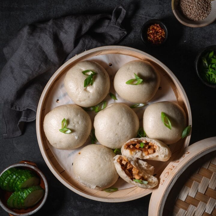 tofu steamed buns in a steamer basket.