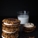 Oatmeal cookie sandwiches stacked.