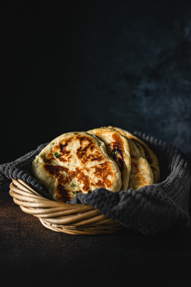 Three Cheese Stuffed Naan in a basket.