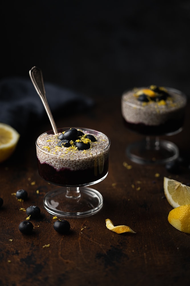 Chia pudding with blueberry jam and lemon zest.
