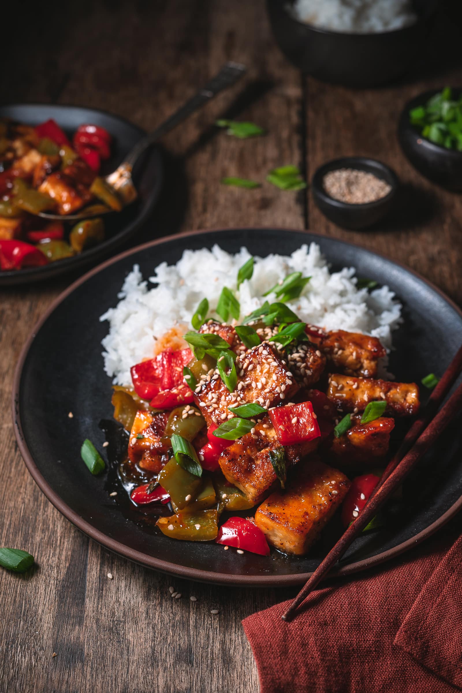 Sweet Chili tofu topped with sesame seeds and scallions.