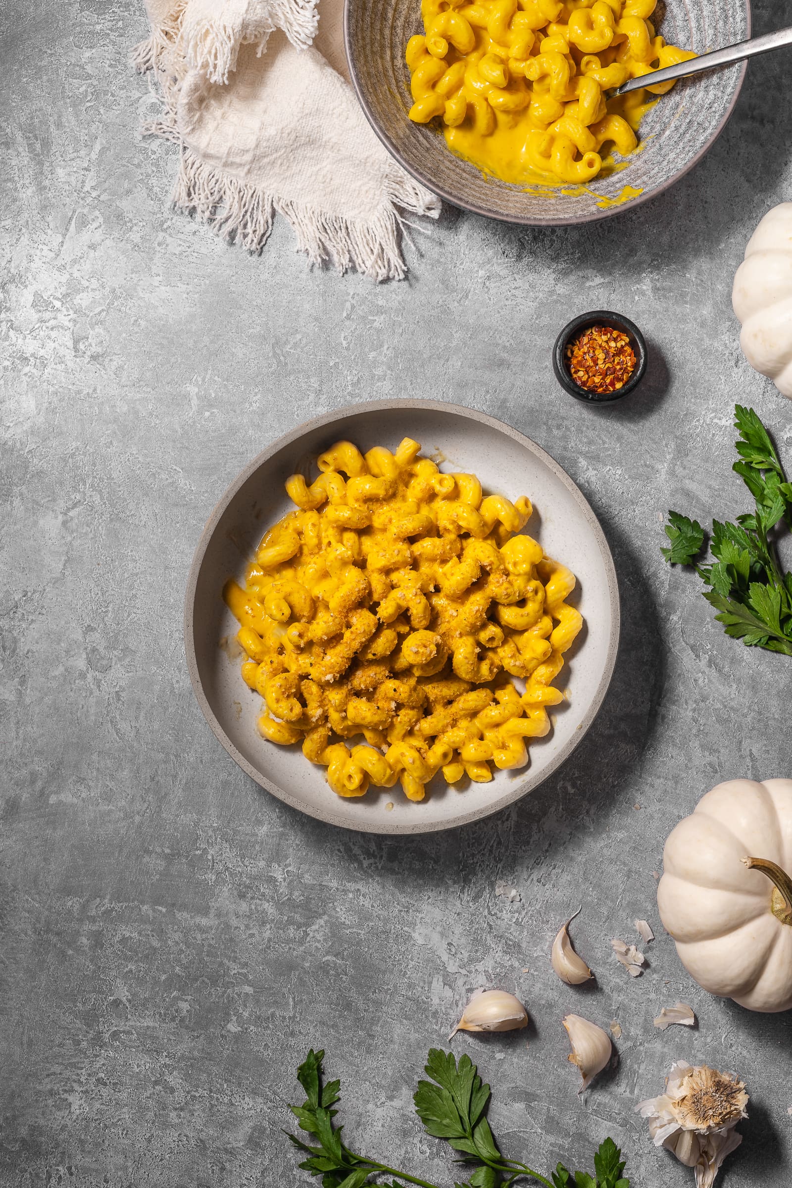 Plate of pumpkin pasta in a serving bowl.