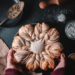 Cinnamon sugar star bread sprinkled with powdered sugar