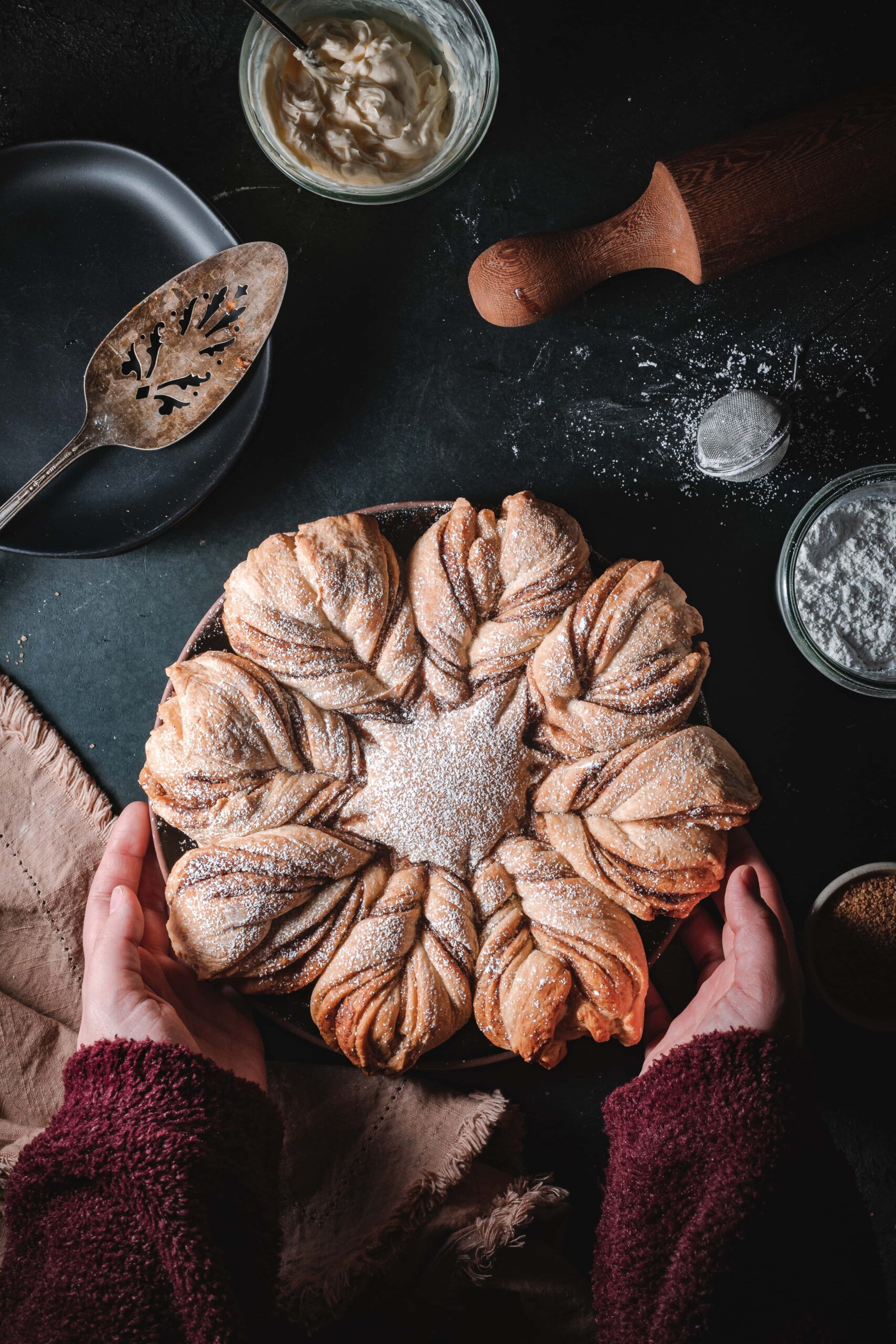 Cinnamon sugar star bread sprinkled with powdered sugar