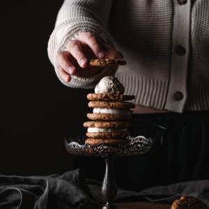 Stack of Ginger Cookie Sandwiches w/ Spiced Cream Cheese Frosting.