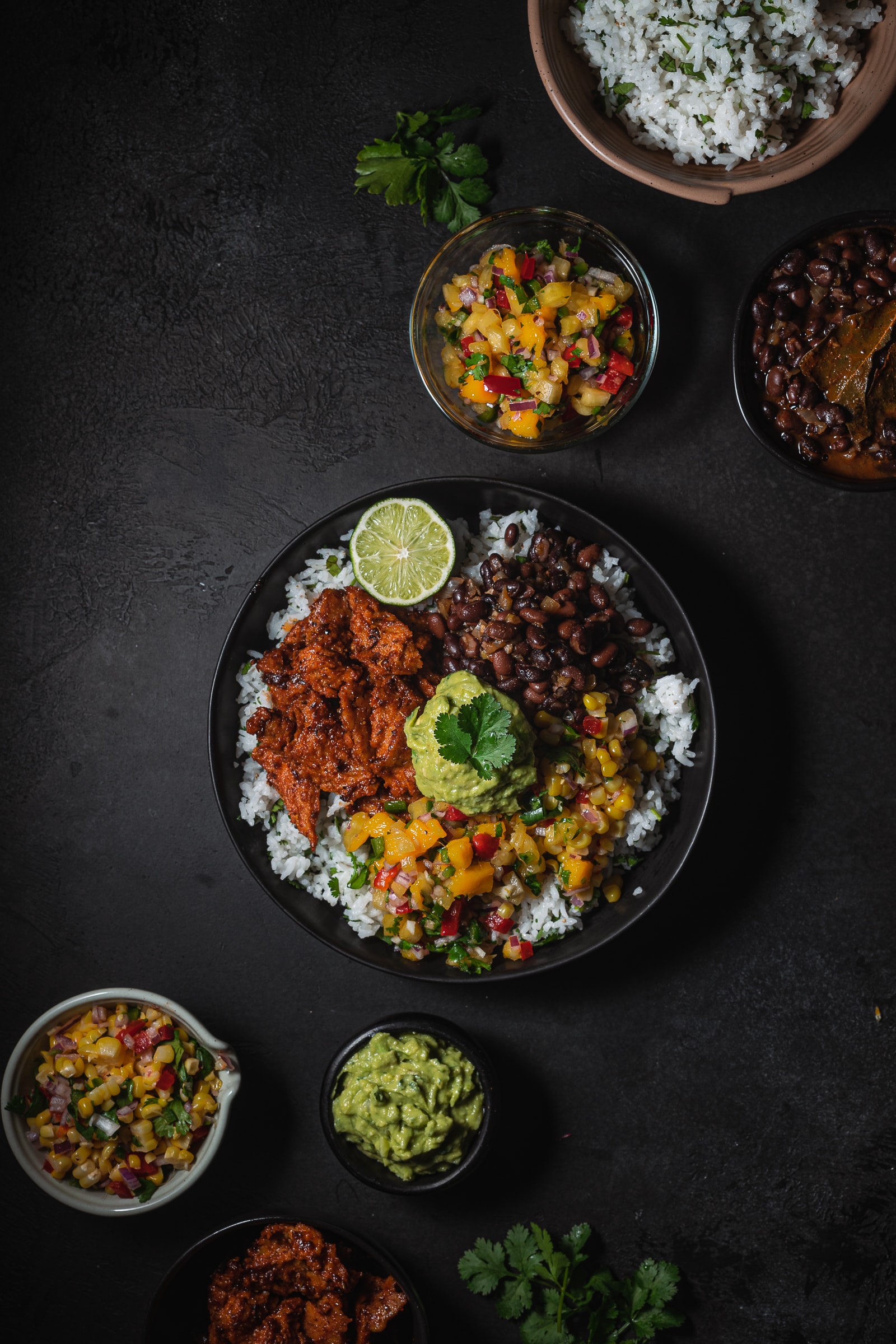 Burrito Bowl with salsa, beans, rice, chicken seitan and guacamole.