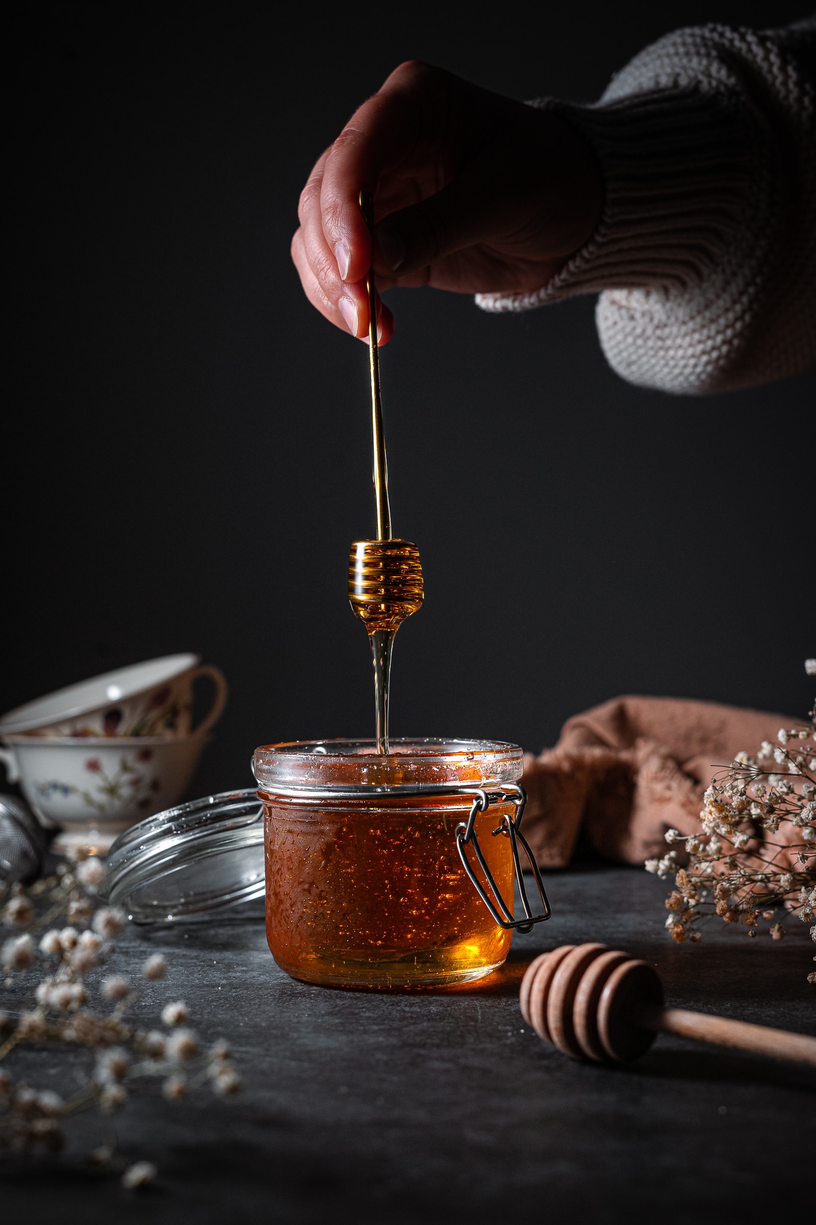 honey being pulled to show texture.