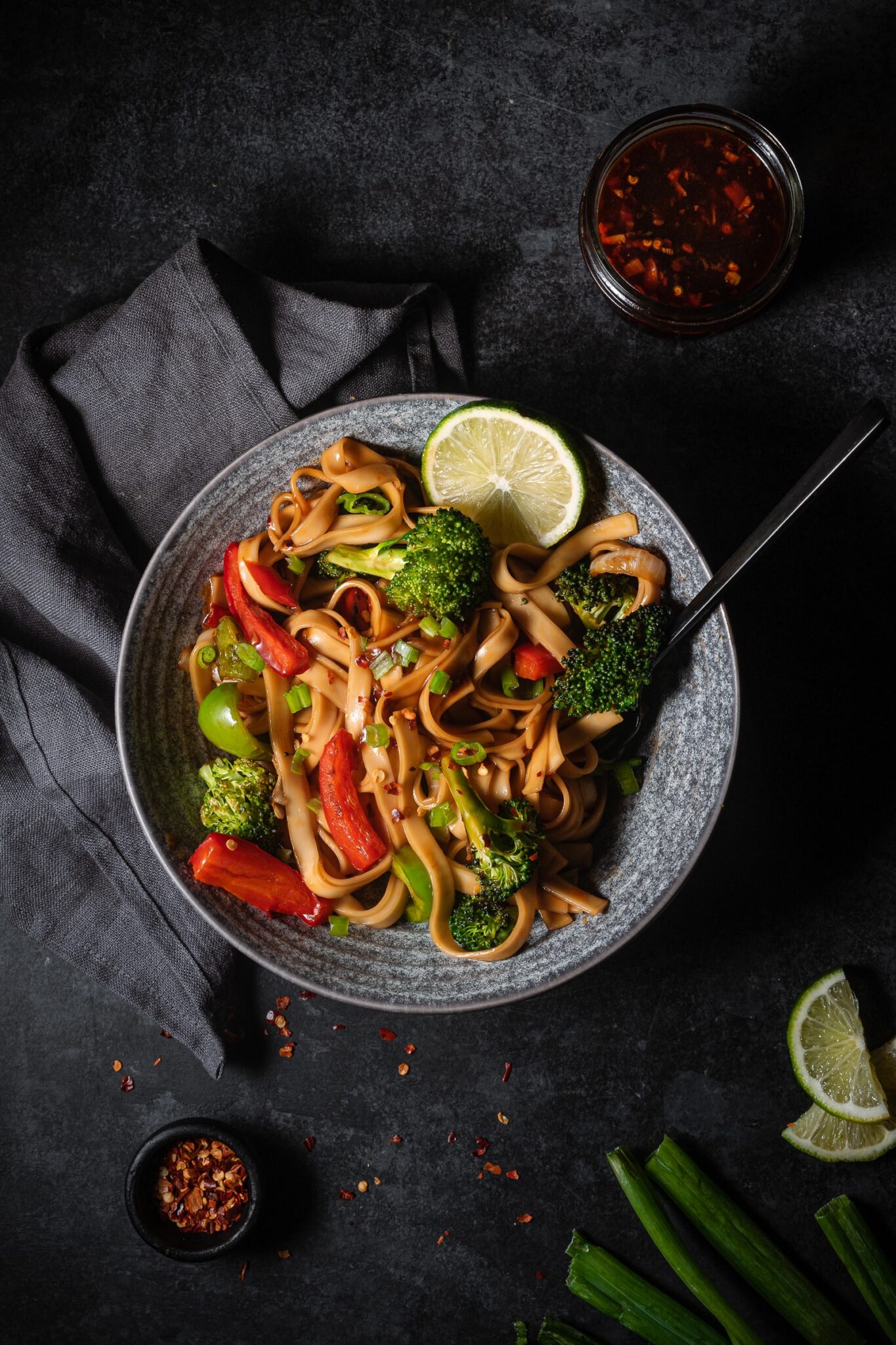 Vegetable stir fry in a bowl with stir fry sauce.