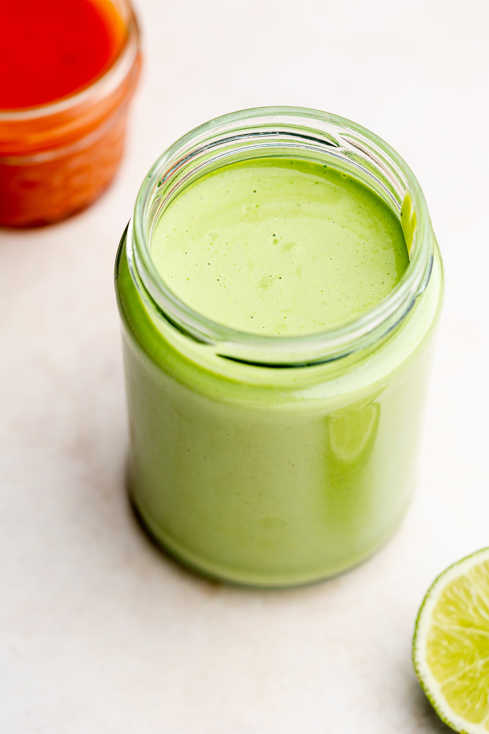 Cilantro lime sauce in a jar.
