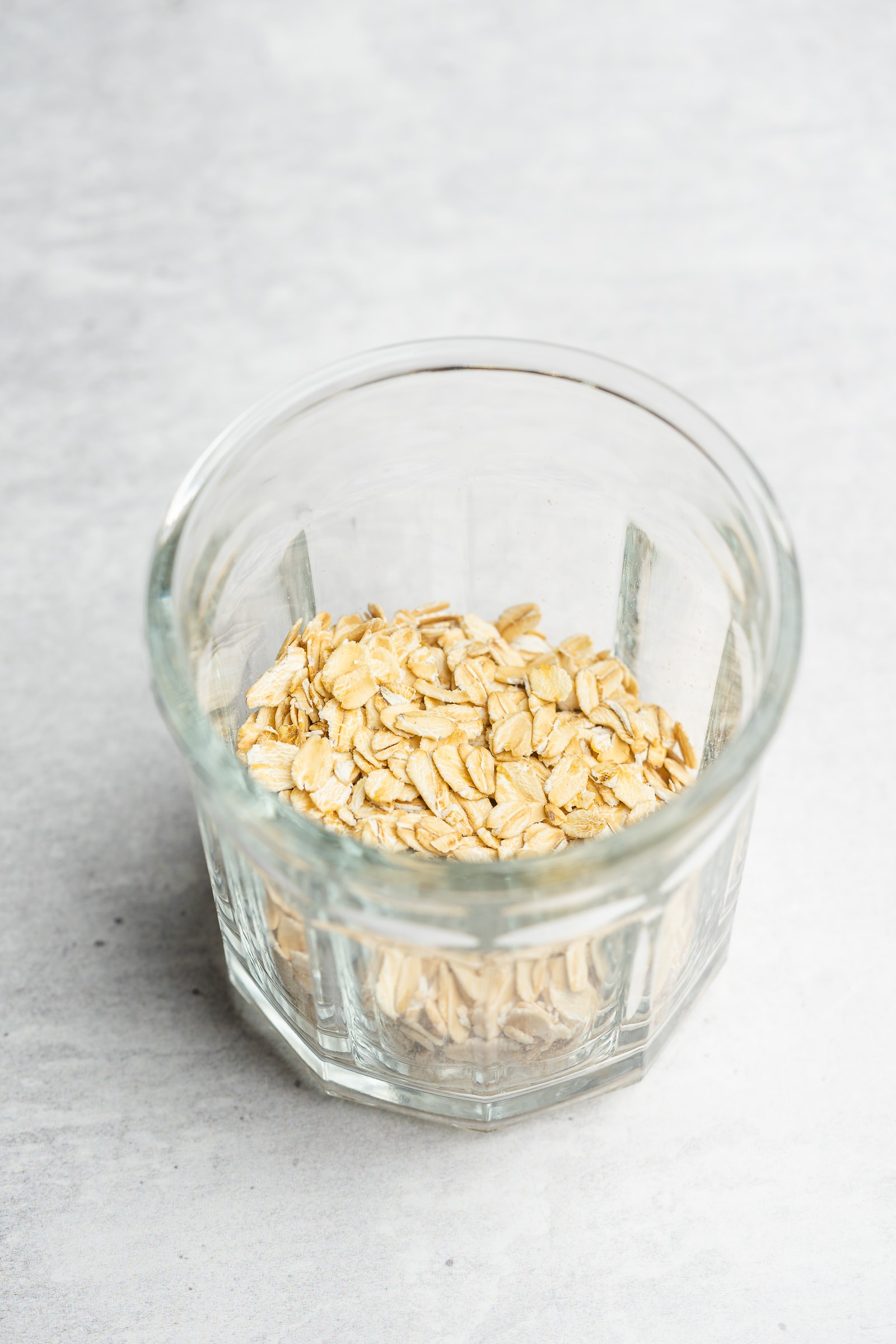 Raw old-fashioned oats in a jar.