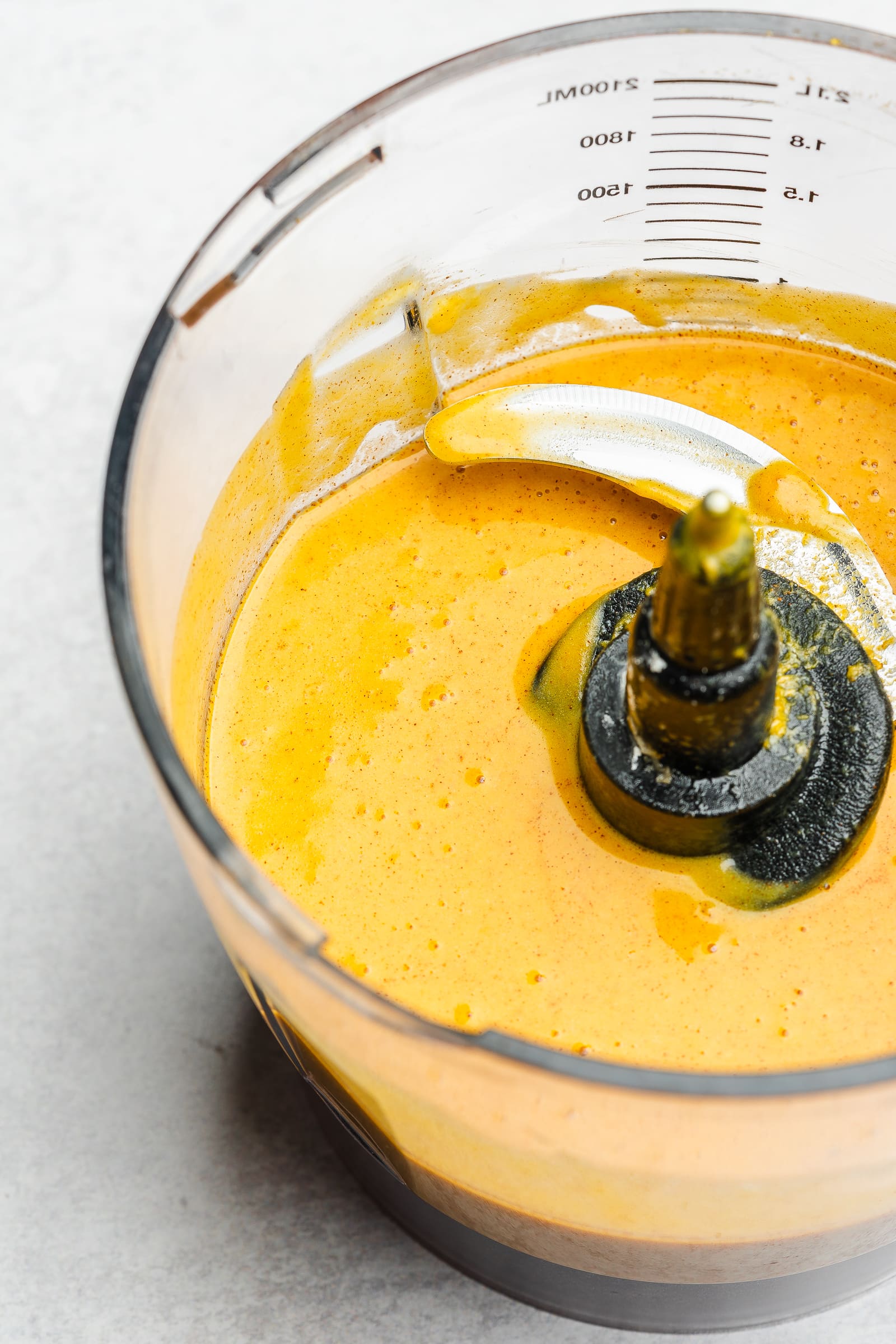 Pumpkin pie filling in food processor.