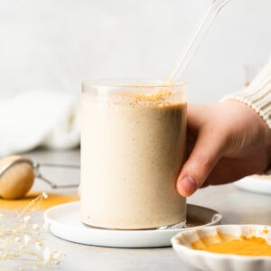 Peanut butter smoothie garnished with cinnamon.