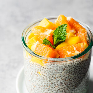 Orange and mango topped chia and flax seed pudding.