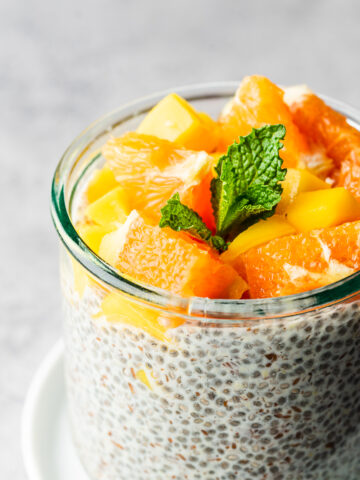 Orange and mango topped chia and flax seed pudding.
