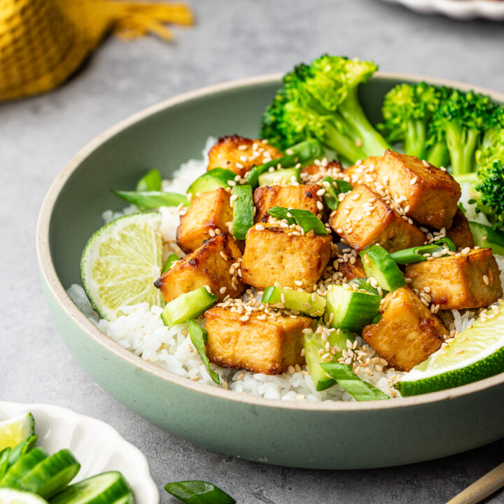 Miso marinated tofu served over white rice with cucumber, green onion, and broccoli.