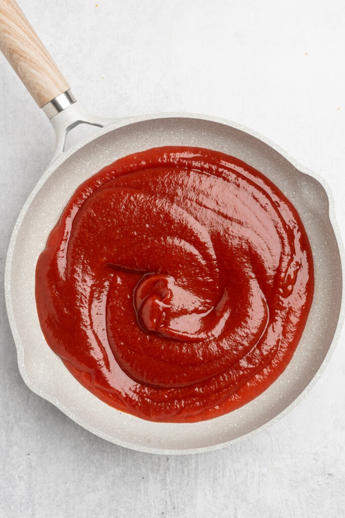 Ketchup is a pan before adding remaining bbq sauce ingredients.
