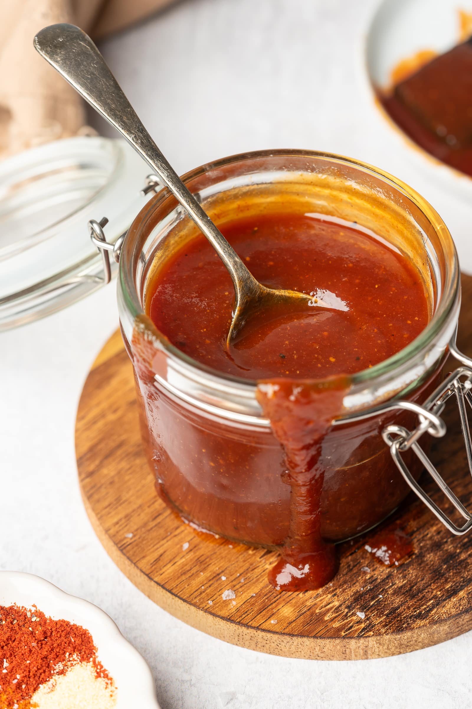 Vegan bbq sauce in a small glass jar.