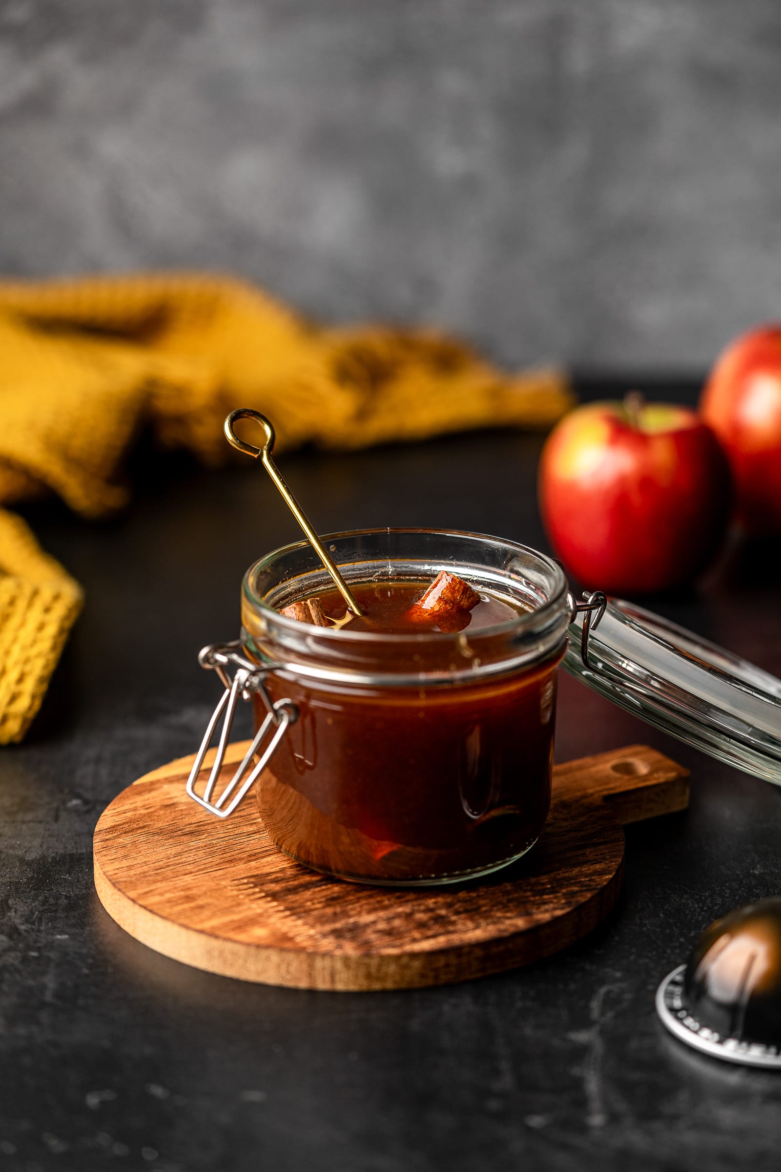 Apple brown sugar syrup in a small jar.
