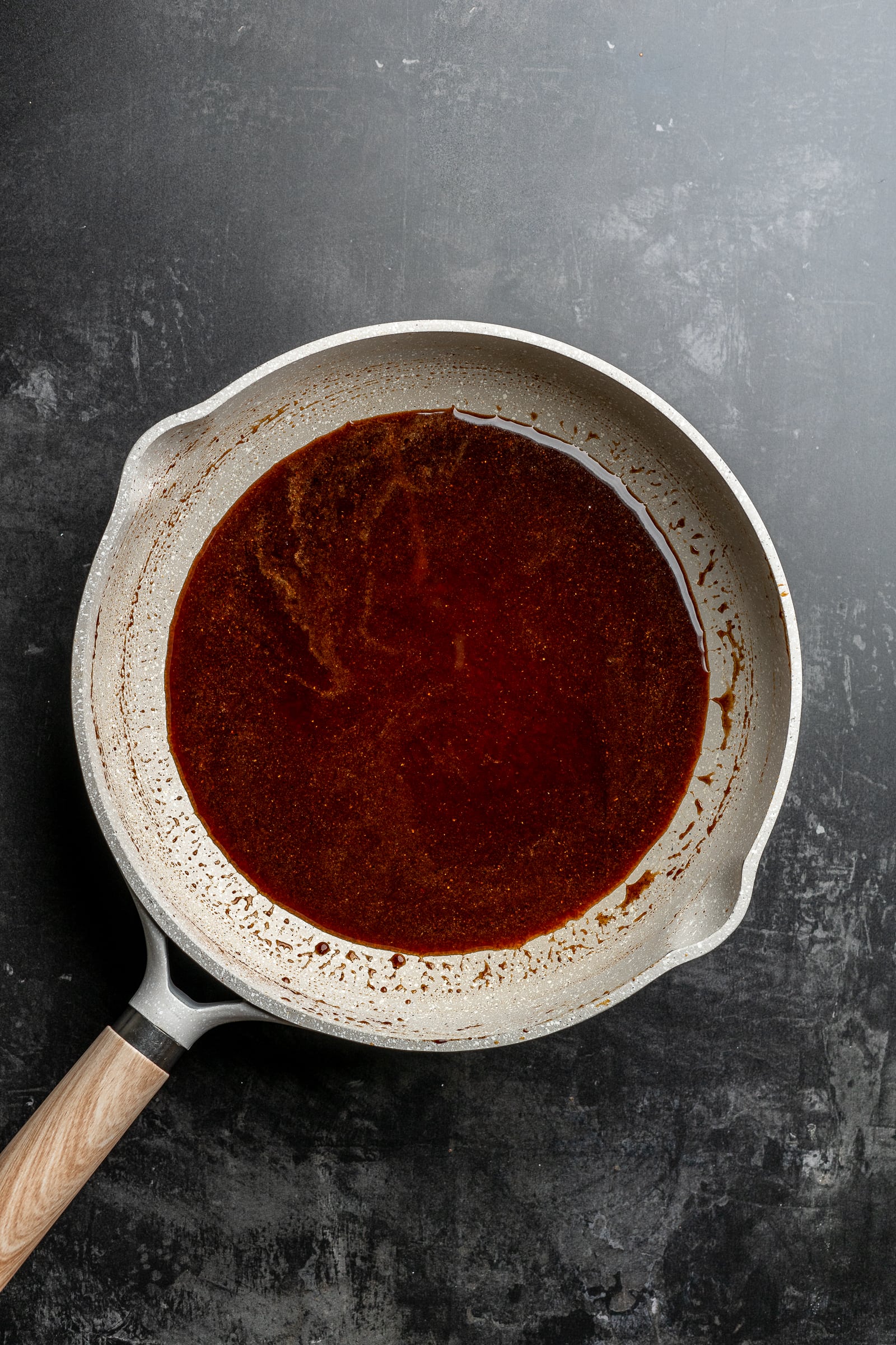 Brown sugar spiced syrup in a pan.