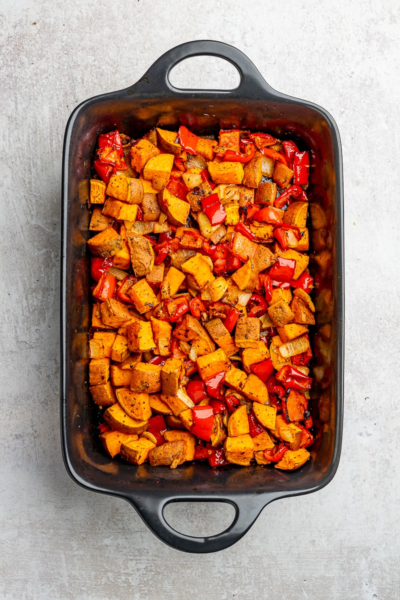 Roasted vegetables in a large baking dish.