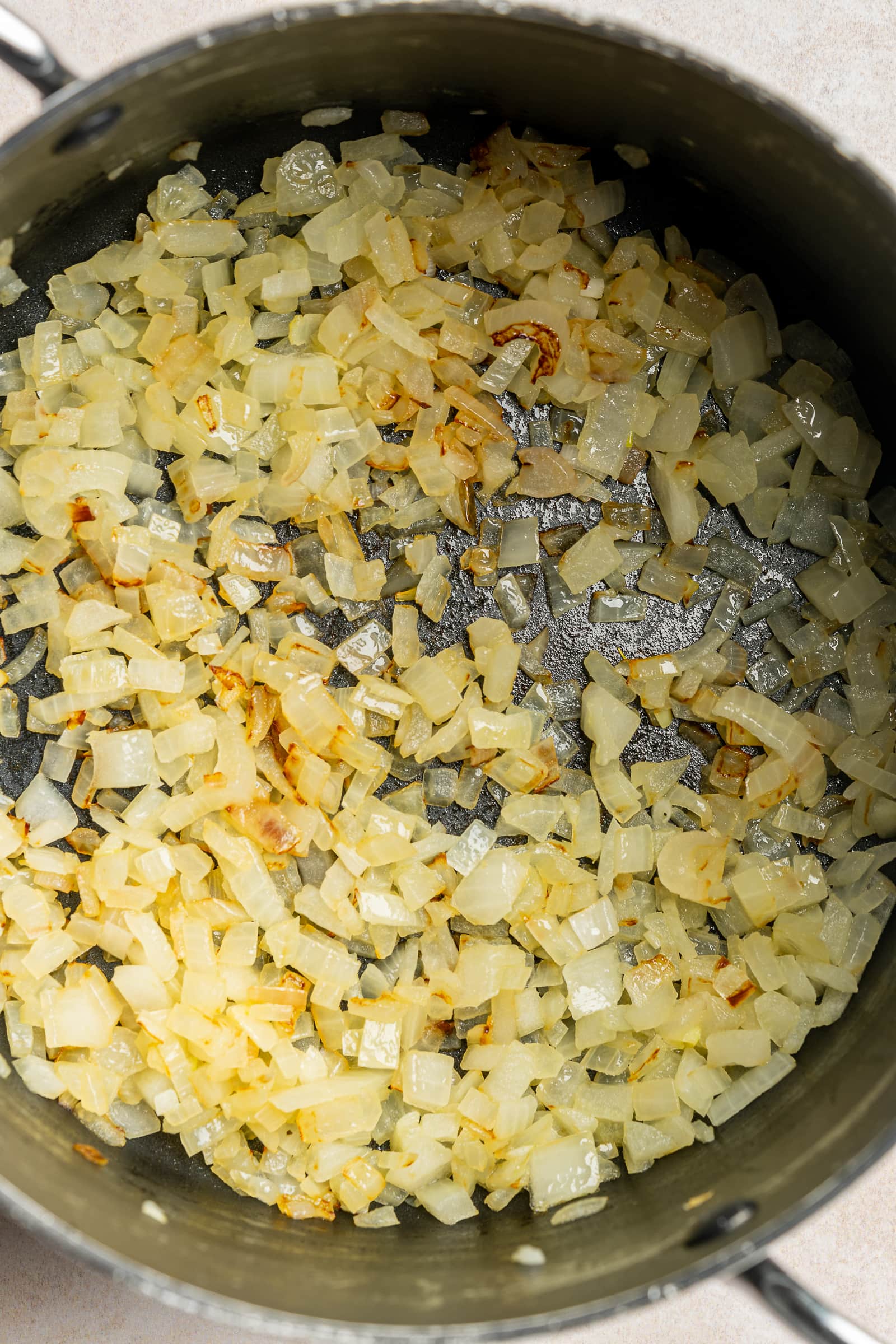 Sautéed onions in a large soup pot.