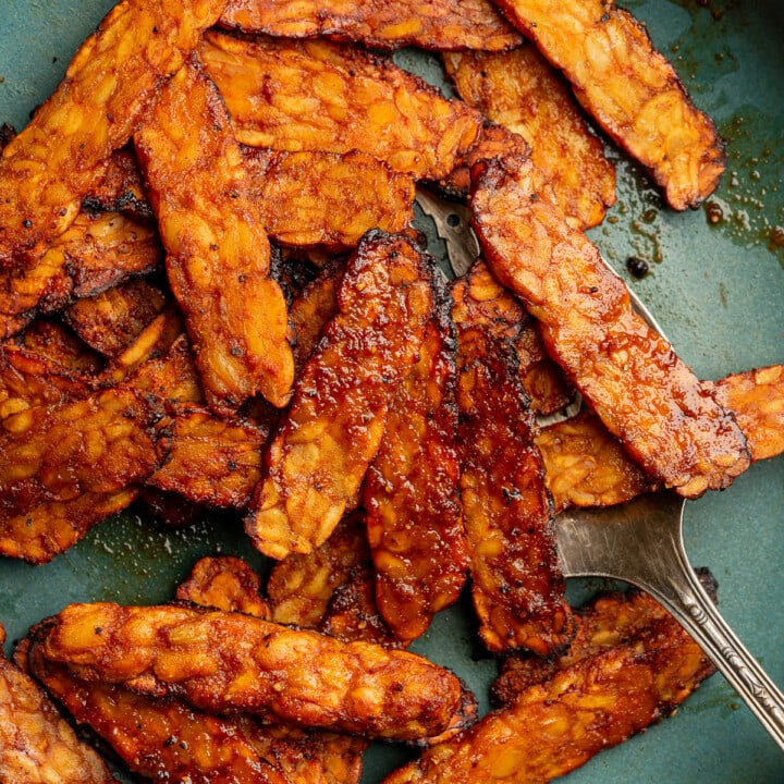 Close up of air fried tempeh strips.