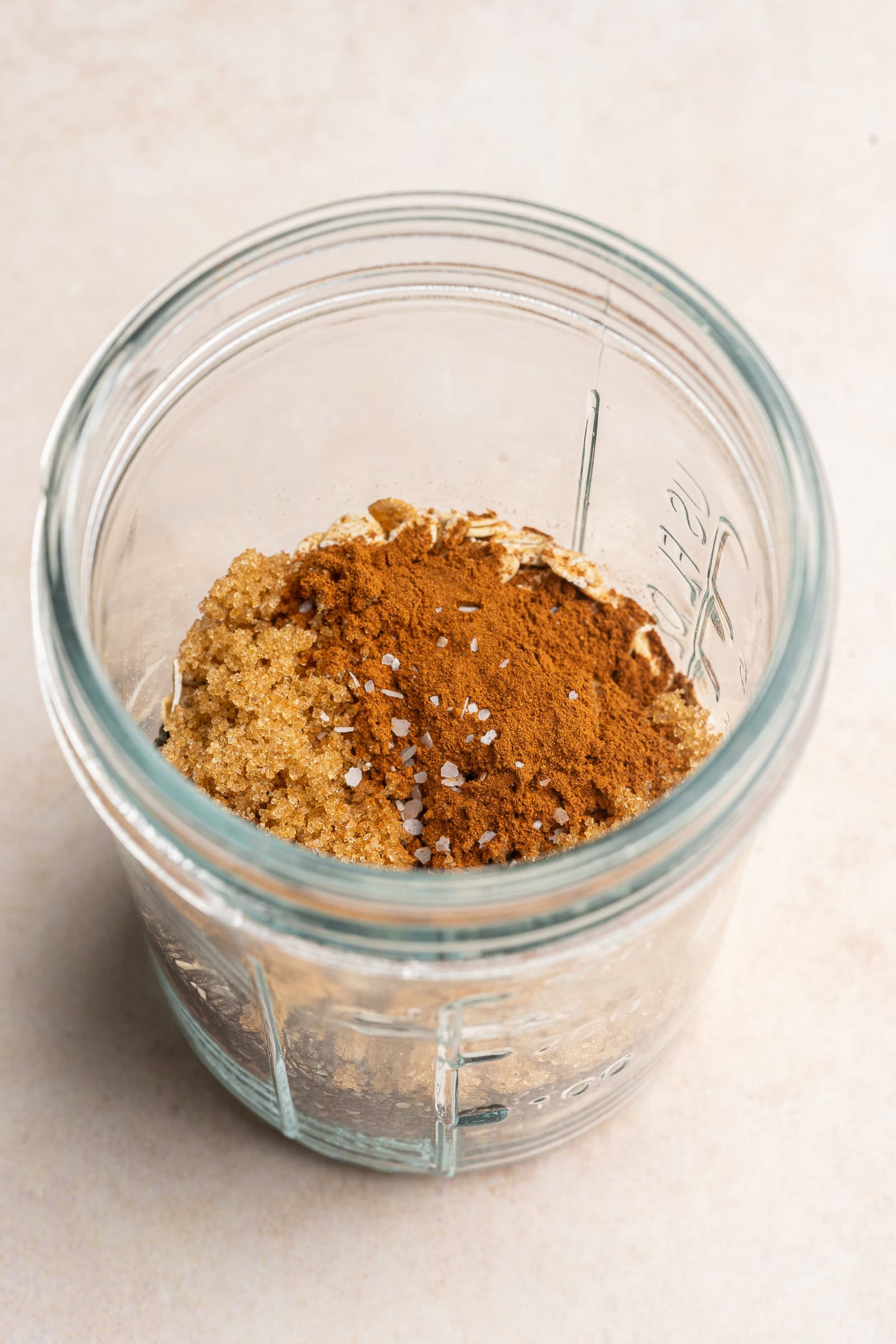 Cookie dough overnight oat ingredients in a glass jar.