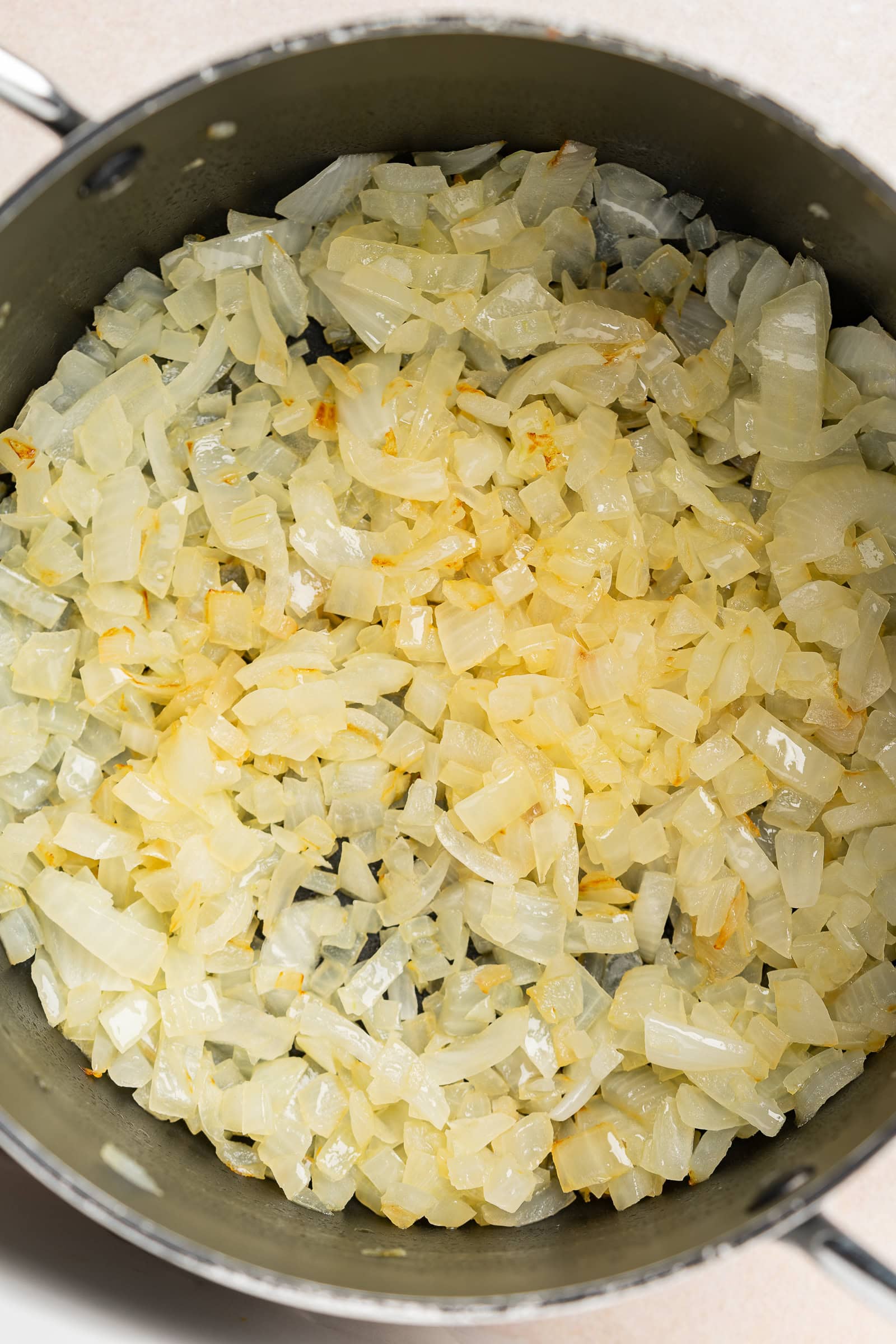 Sautéed onions in a large soup pot.