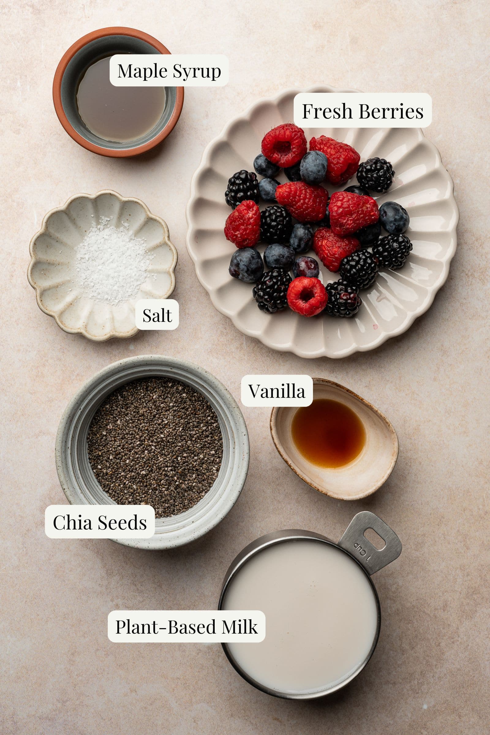 Labeled ingredients for berry chia pudding.