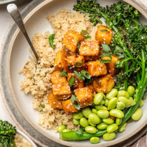 Sweet chili tofu served over quinoa, broccolini, and edamame.