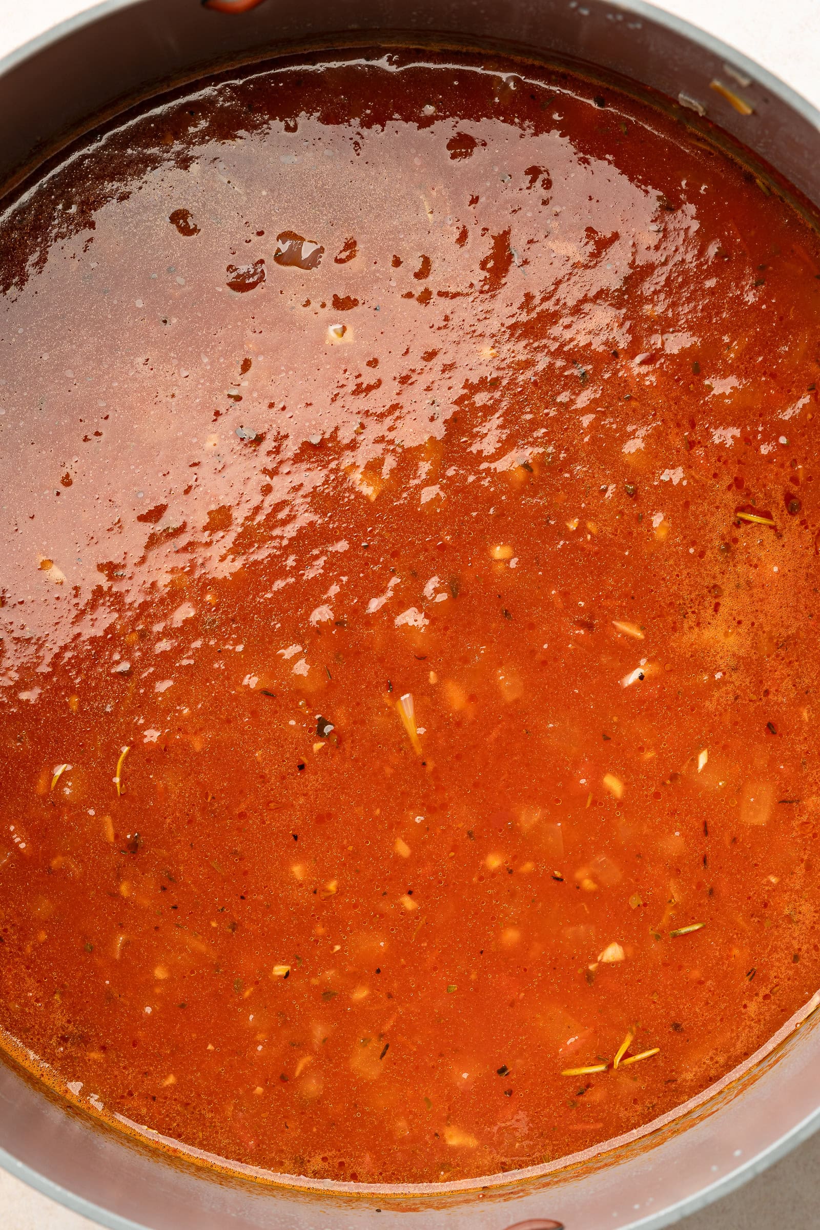Tomato broth after simmering in large soup pot.