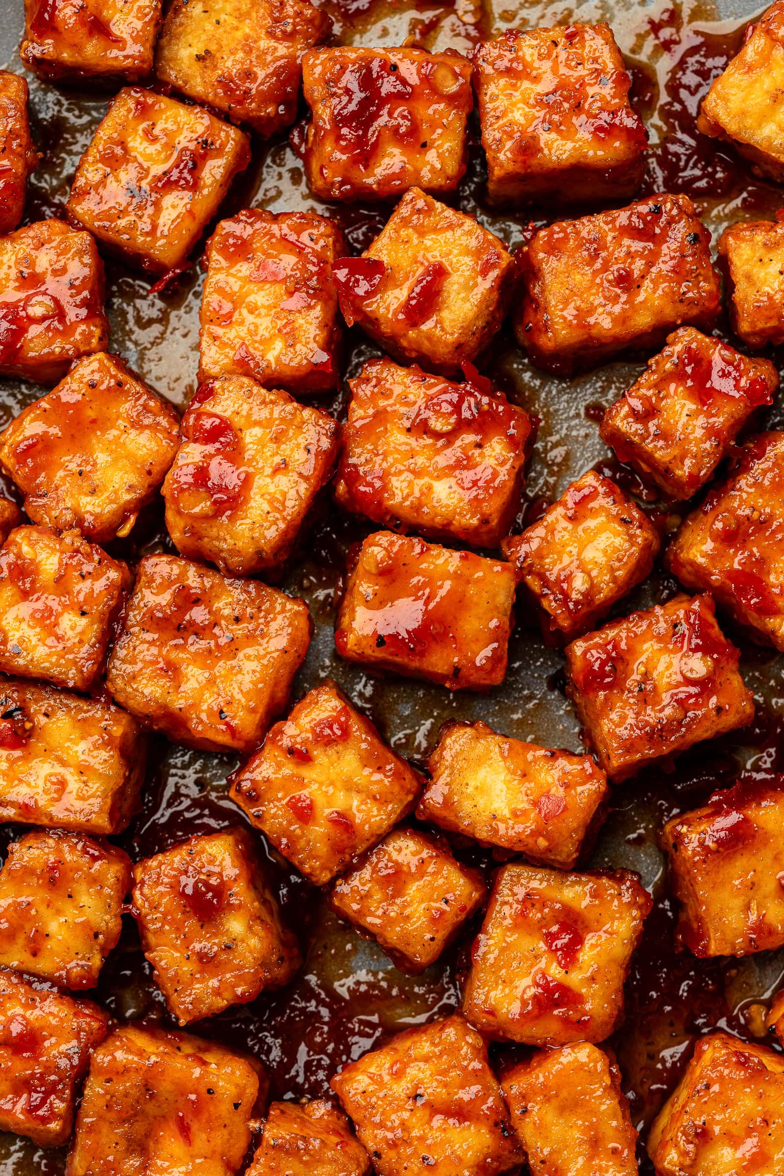 Close up of harissa glazed tofu cubes.