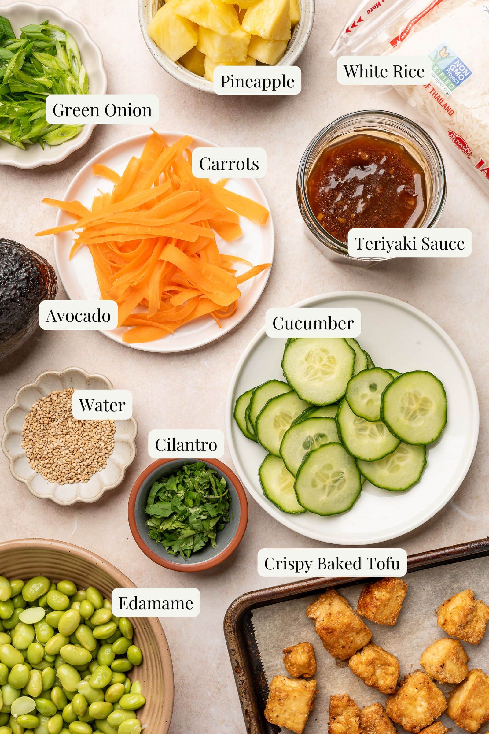 Labeled and portioned ingredients for teriyaki tofu rice bowl.