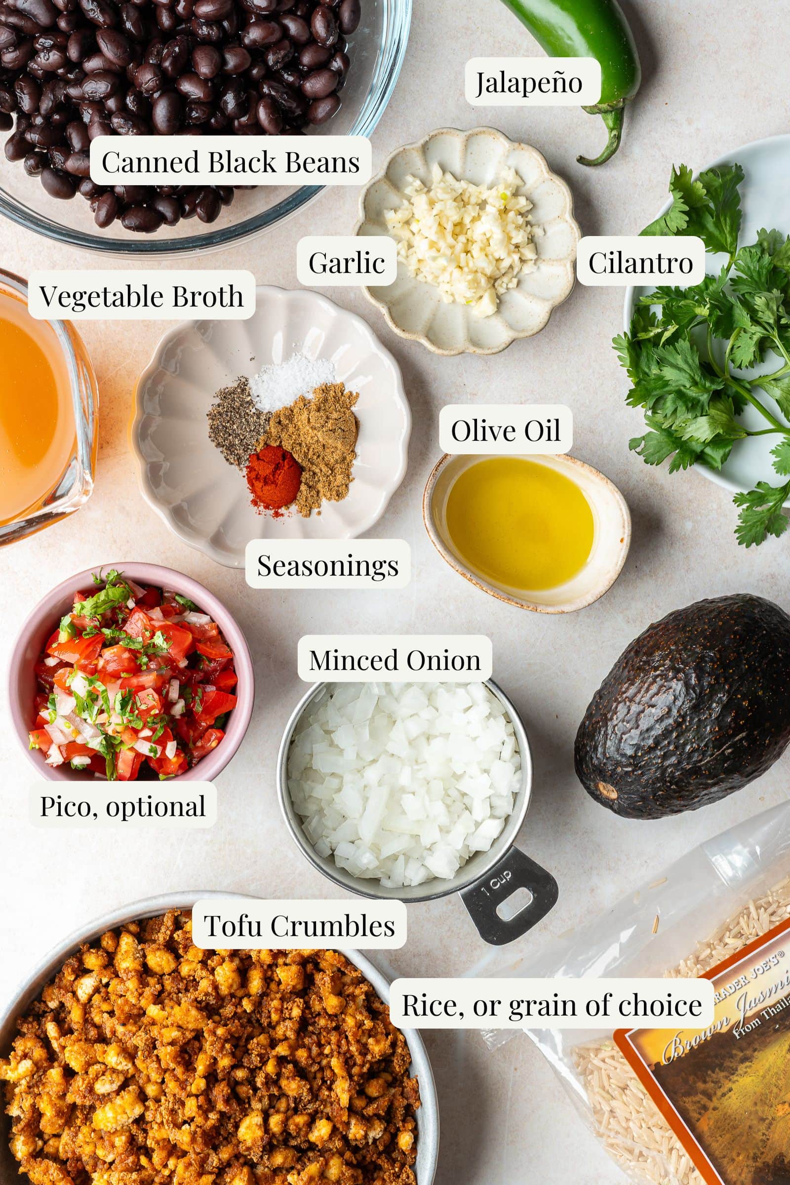Labeled ingredients for tofu burrito bowl with black beans.