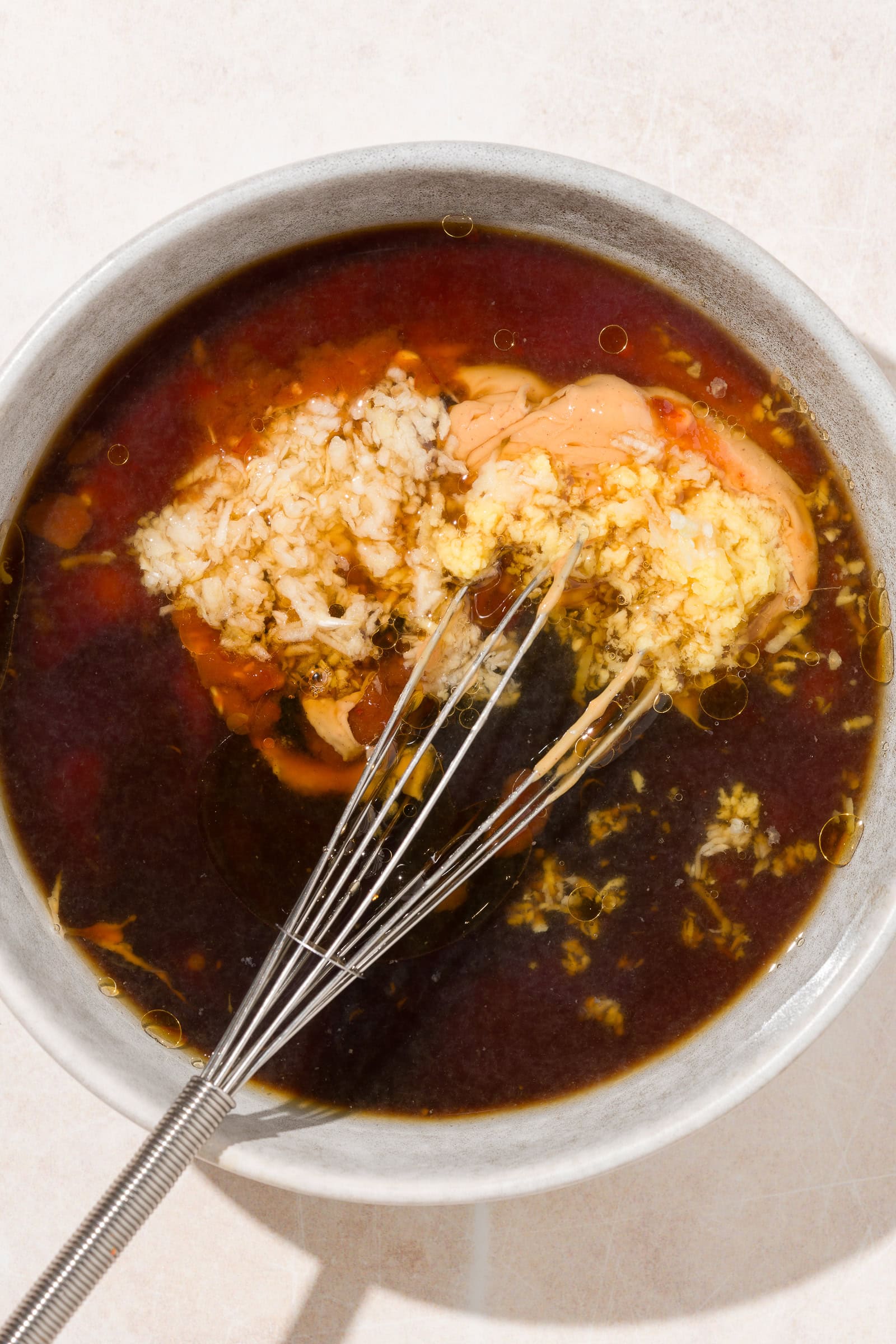 Peanut sauce ingredients in a bowl before being mixed.