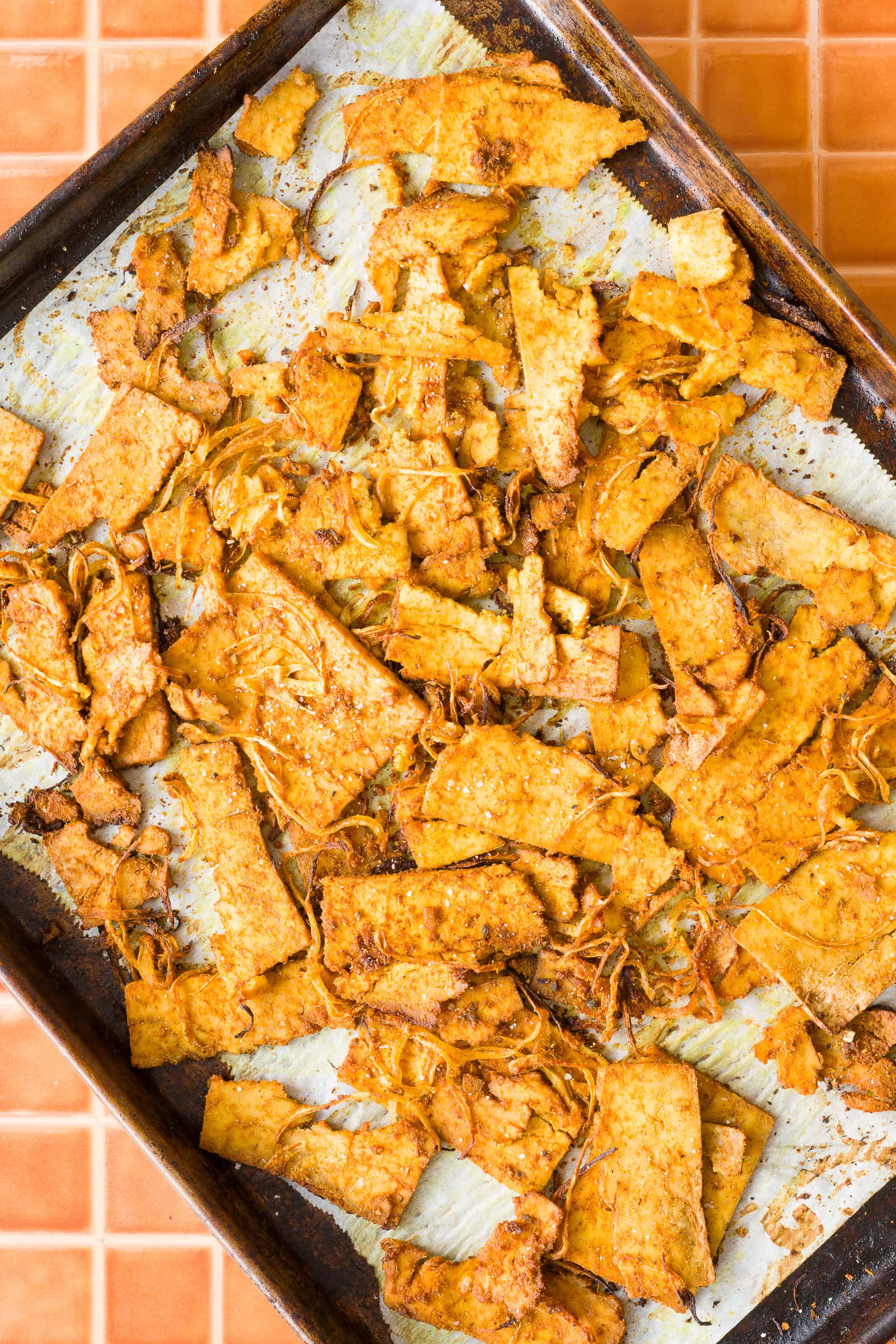 Roasted tofu shawarma and onions with golden crispy edges.