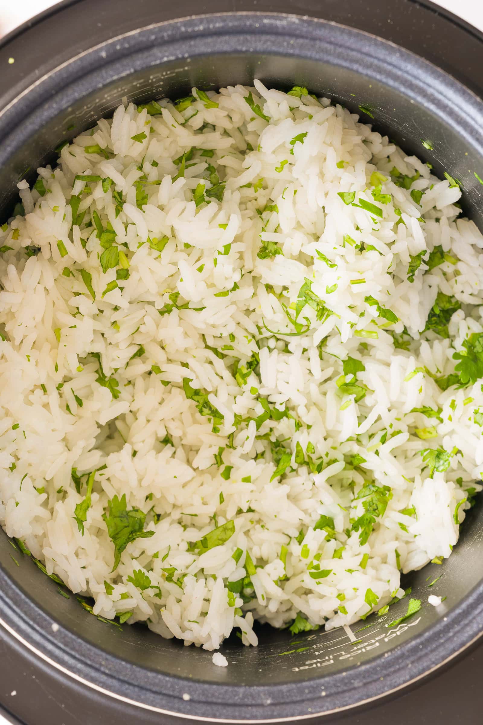 Cilantro lime rice in a rice cooker.