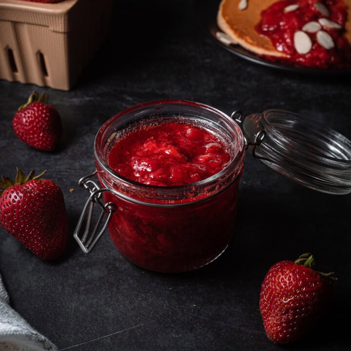 strawberry jam in a glass jar.